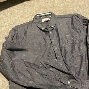 Button down dress shirt that no longer fits.